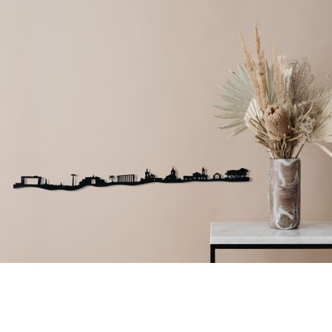Skyline 3d de decoración en pared de la ciudad de Puerto Real hecho con materiales reciclados